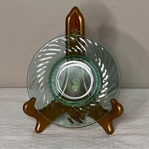 Vintage uranium glass swirl saucer, measuring 6 inches in diameter